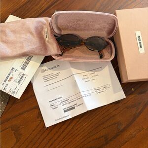 Miu Miu Tortoiseshell Oval Sunglasses with Brown Lenses